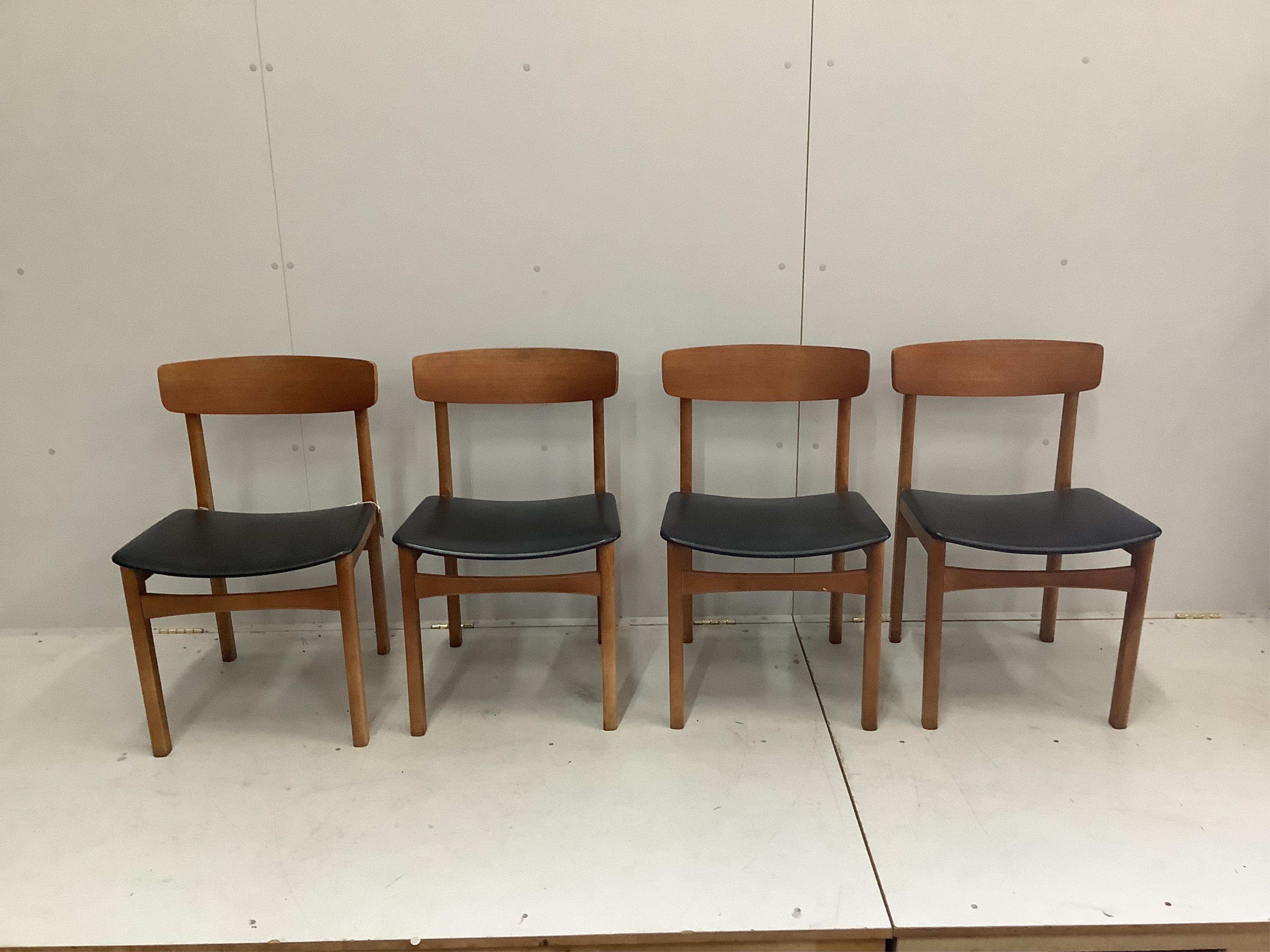 A mid century teak dining table and a set of four chairs. Condition - fair